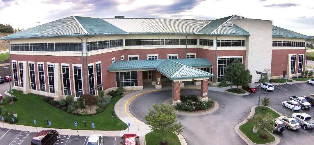 THE UNIVERSITY OF KANSAS HEALTH SYSTEM ST. FRANCIS CAMPUS AND TALLGRASS SURGICAL CENTER CLOSE TRANSACTION